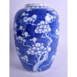 A 19TH CENTURY CHINESE BLUE AND WHITE PORCELAIN JAR Qing, painted with prunus. 18.5 cm high.