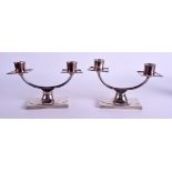 A PAIR OF STYLISH MAPPIN & WEBB SILVER CANDLESTICKS. 26 oz weighted. 18 cm x 12 cm.