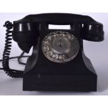 A VINTAGE BAKELITE TELEPHONE, stamped underside. 24 cm wide