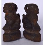 A PAIR OF IRON WEIGHTS, in the form of foo dogs. 11 cm high.