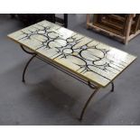 A STYLISH 1950'S ABSTRACT TOP COFFEE TABLE, formed with curved magazine rack top supported frame. 4