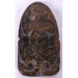 A LARGE EASTERN HARDSTONE PLAQUE, carved in relief with a cat. 13 cm long.