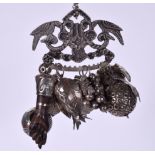 A GROUP OF SILVER COLOURED BRAZILIAN CHARMS BY GERSON BAHIA, unusually large and of varying form, s