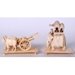 AN EARLY 20TH CENTURY INDIAN CARVED IVORY FIGURE ON AN ELEHANT, together with two oxon pulling a ca