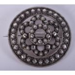 A VICTORIAN SILVER BRIGHT CUT SILVER BROOCH. 6.5 cm diameter.