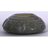 AN EARLY 20TH CENTURY CHINESE ISLAMIC MARKET GREEN JADE BRUSH WASHER, carved with flowering vines.