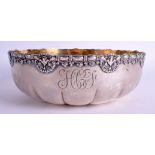 A TIFFANY & CO SILVER BOWL decorated with shells and foliage. 17.6 oz. 22 cm wide.