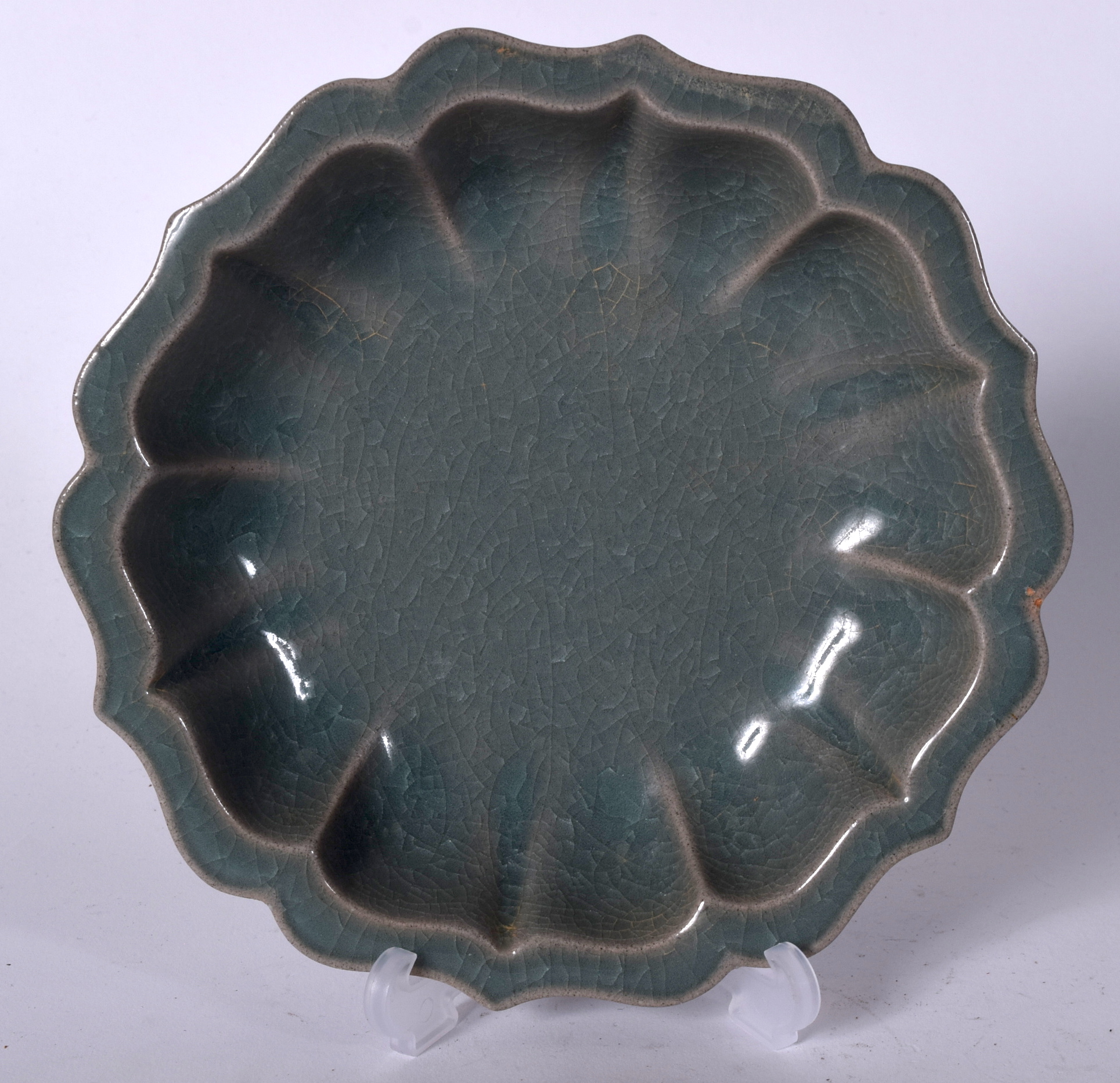 A CHINESE CELADON GLAZED PORCELAIN DISH, lobed in form. 19.5 cm wide.