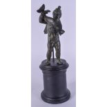 A 19TH CENTURY ITALIAN GRAND TOUR BRONZE FIGURE OF A WINGED MALE modelled holding a dolphin. Bronze