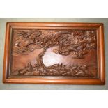 A MID 19TH CENTURY CHINESE CARVED HARDWOOD HONGMU DRAGON PANEL. 92 cm x 58 cm.