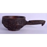AN UNUSUAL EARLY 20TH CENTURY CONTINENTAL TRIBAL CARVED WOOD BOWL decorated with foliage. 35 cm x 1