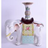 A LATE 19TH CENTURY CHINESE FAMILLE ROSE FIGURE OF AN ELEPHANT Qing. 26 cm x 21 cm.