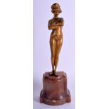 AN ART DECO FRENCH GILT BRONZE FIGURE OF A NUDE FEMALE modelled upon a marble base. 23 cm high.