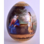 A FINE 19TH CENTURY RUSSIAN IMPERIAL FACTORY PORCELAIN EASTER EGG St Petersburg, painted with two f