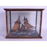AN UNUSUAL EARLY 20TH CENTURY SHIPS DIORAMA within an oak case. 33 cm x 26 cm.