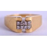A 1970S 18CT GOLD AND DIAMOND RING. 7.5 grams. Size V.