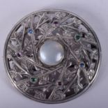 AN ARTS AND CRAFTS SCOTTISH IONA STYLE CELTIC BROOCH. 9.5 cm diameter.