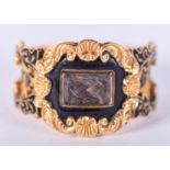A GEORGE III 18CT GOLD AND ENAMEL MOURNING RING. 7.9 grams. Size Q.