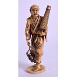 A 19TH CENTURY JAPANESE MEIJI PERIOD CARVED IVORY OKIMONO modelled holding a parasol. 16.5 cm high.