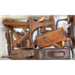 A COLLECTION OF ANTIQUE WOODEN PLANES, together with other assorted tools. (qty)