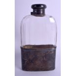 A VINTAGE TIFFANY & CO SILVER MOUNTED GLASS HIP FLASK. 17.5 cm x 9.5 cm.