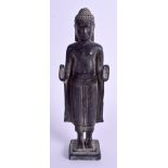 AN EARLY 20TH CENTURY CAMBODIAN KHMER BRONZE FIGURE OF A BUDDHA modelled with palms exposed. 16 cm