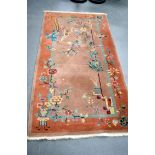 A WANG FU CHINESE ART DECO RUG, decorated with the phoenix bird and precious objects. 178 cm x 93.