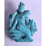 A 19TH CENTURY CHINESE CARVED TURQUOISE AND SILVER BROOCH depicting a seated Guanyin. 3.5 cm x 5 cm