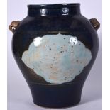 A LARGE 20TH CENTURY CHINESE BLUE AND GROUND PORCELAIN VASE, formed with twin handles. 28 cm high.