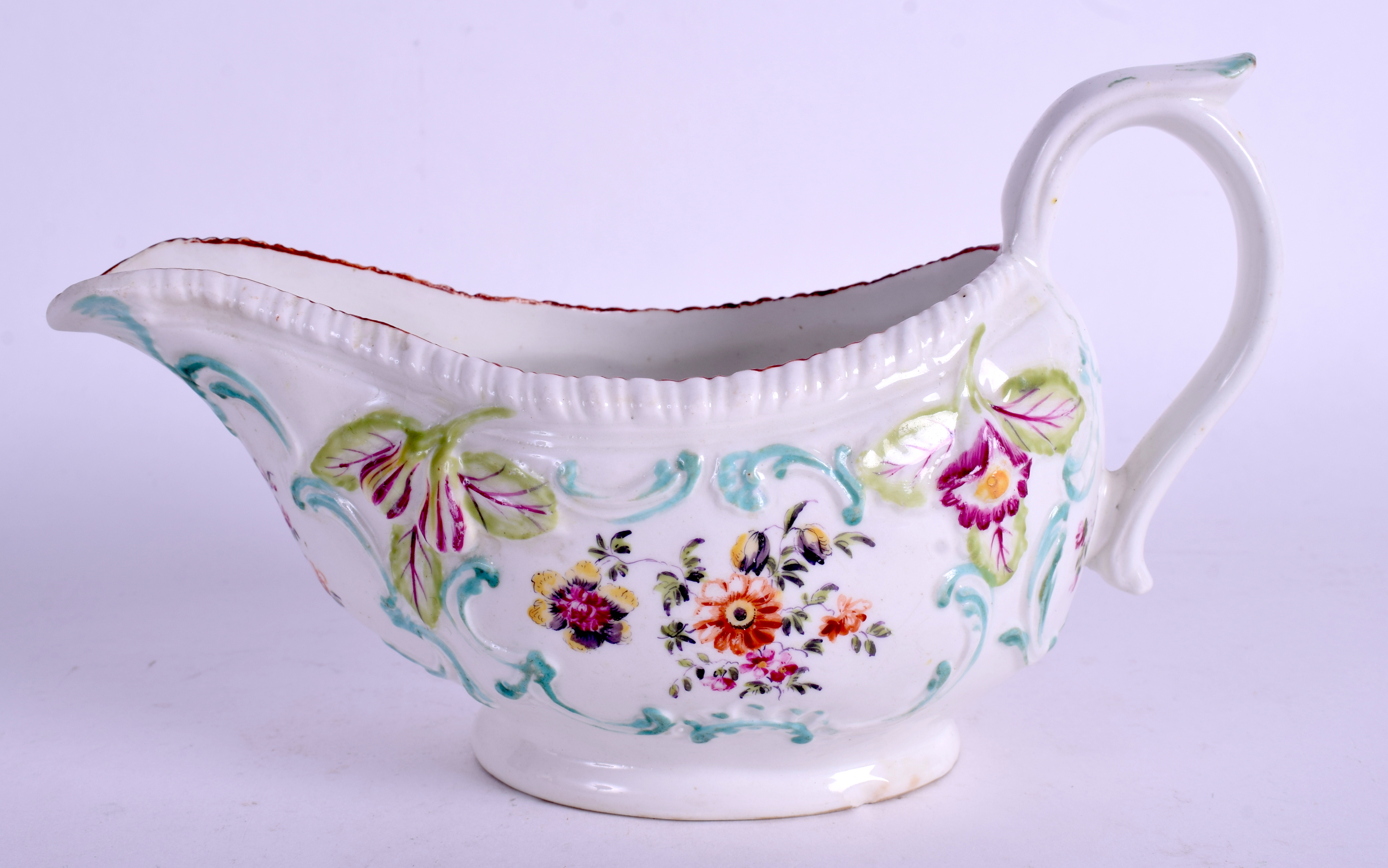 AN 18TH CENTURY DERBY SAUCEBOAT painted with flowers by the Cotton Stem painter, moulded with flowe