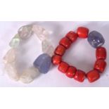 A RED CORAL BRACELET, together with a fluorite example. (2)
