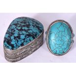 A TURQUOISE INSET WHITE METAL BOX, together with a ring. (2)