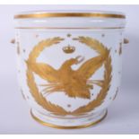 A FRENCH PARIS SEVRES STYLE TWIN HANDLED PORCELAIN ICE PAIL painted with a gilt bird. 19 cm x 19 cm