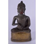 AN 18TH CENTURY SOUTH EAST ASIAN POLYCHROMED BRONZE BUDDHA. 12 cm high.