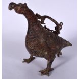 A CHINESE BRONZE CENSER IN THE FORM OF A MYTHICAL BIRD, formed standing with chilong handle. 23 cm