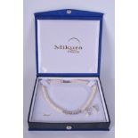 A PAIR OF 18CT WHITE GOLD MIKURA PEARL EARRINGS with matching necklace. (3)