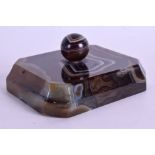 AN ANTIQUE CARVED AGATE DESK PAPERWEIGHT. 9 cm x 7 cm.