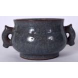 A CHINESE ICE EFFECT CRACKLE GLAZED POTTERY CENSER, formed with twin handles and flared rim. 15.5 c