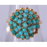 A VICTORIAN HIGH CARAT GOLD AND TURQUOISE RING. 4.3 grams. Size O.