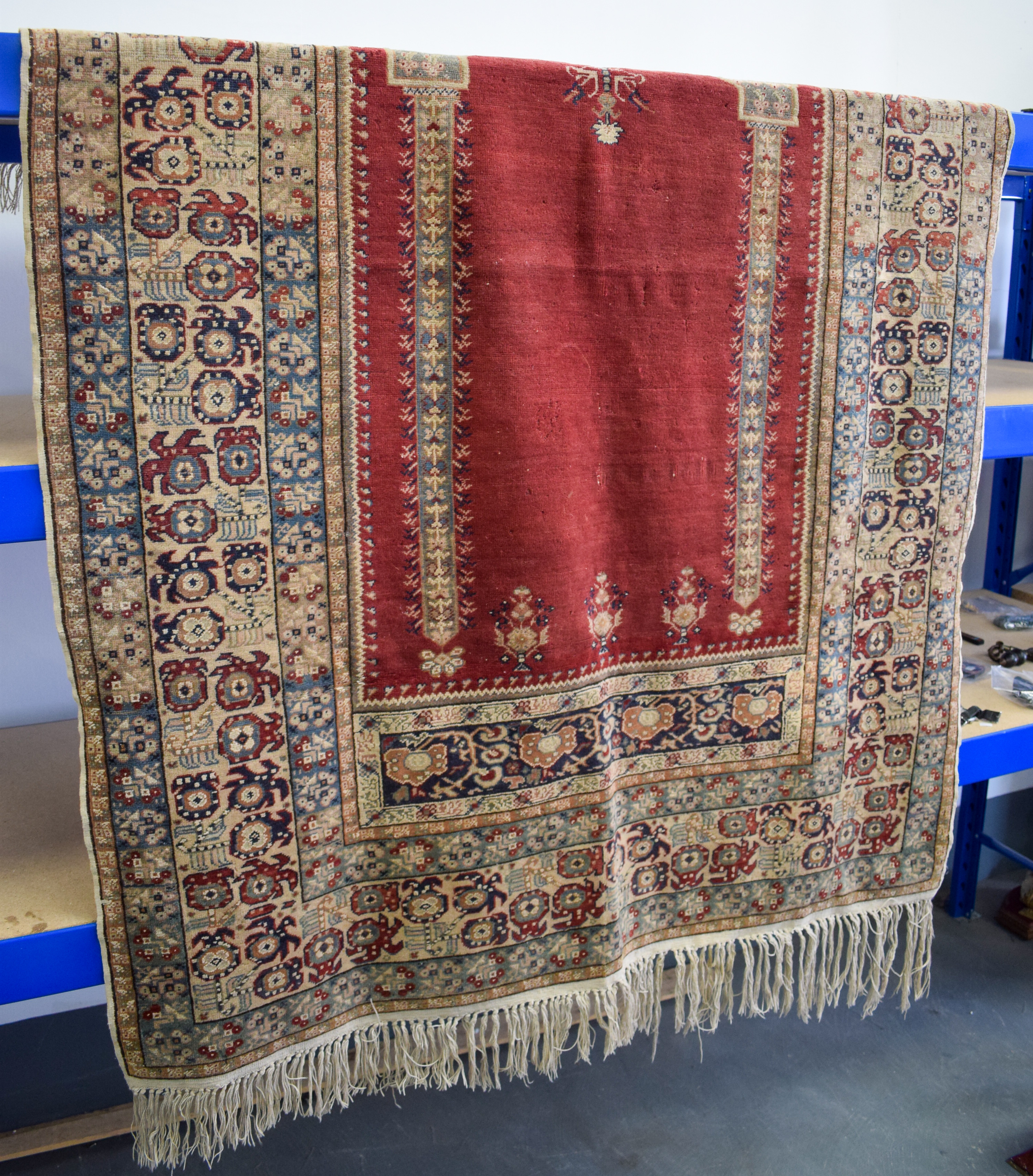 AN EARLY 20TH CENTURY MIDDLE EASTERN SILK PRAYER RUG decorated with motifs. 190 cm x 123 cm.