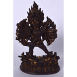 A CHINESE SINO TIBETAN GILT BRONZE BUDDHA OR STATUE, in the form of a multi arm god standing upon a