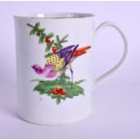 AN 18TH CENTURY WORCESTER SMALL MUG painted with flowers and a bird. 8.75 cm high.