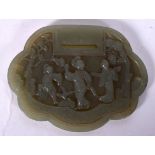 A CHINESE CARVED GREEN JADE BELT BUCKLE, formed with three figures dancing beside flowering rock. 8