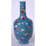 A CHINESE BLUE GROUND PORCELAIN VASE BEARING QIANLONG MARKS, decorated with butterflies amongst fol
