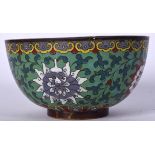 A 17TH CENTURY MING DYNASTY CHINESE CLOISONNÉ ENAMEL BOWL, decorated with flowering vines. 16.5 cm