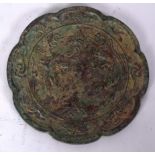 A 20TH CENTURY CHINESE BRONZE HAND MIRROR, decorated in relief with birds. 16 cm wide.