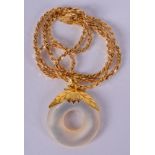 A 14CT GOLD AND MOTHER OF PEARL PENDANT with 9ct gold chain. 9.8 grams.