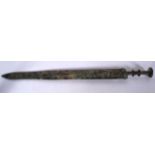A BRONZE SWORD, archaic style. 55.5 cm long.