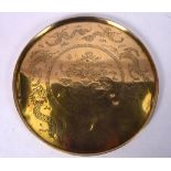 AN EARLY 20TH CENTURY CHINESE BRONZE DISH, incised with a dragon. 28 cm wide.