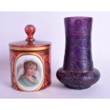 A 19TH CENTURY BOHEMIAN ENAMELLED CRANBERRY JAR AND COVER together a puce glass vase. 13 cm & 14 cm